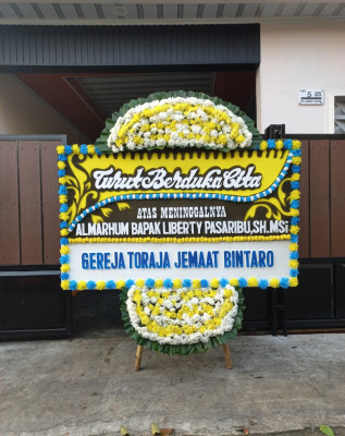 Papan Bunga Duka di Mebarok